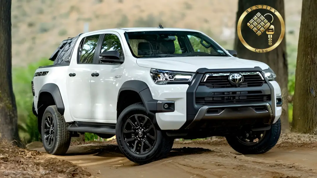 White Toyota Hilux pickup truck for rent in Cebu