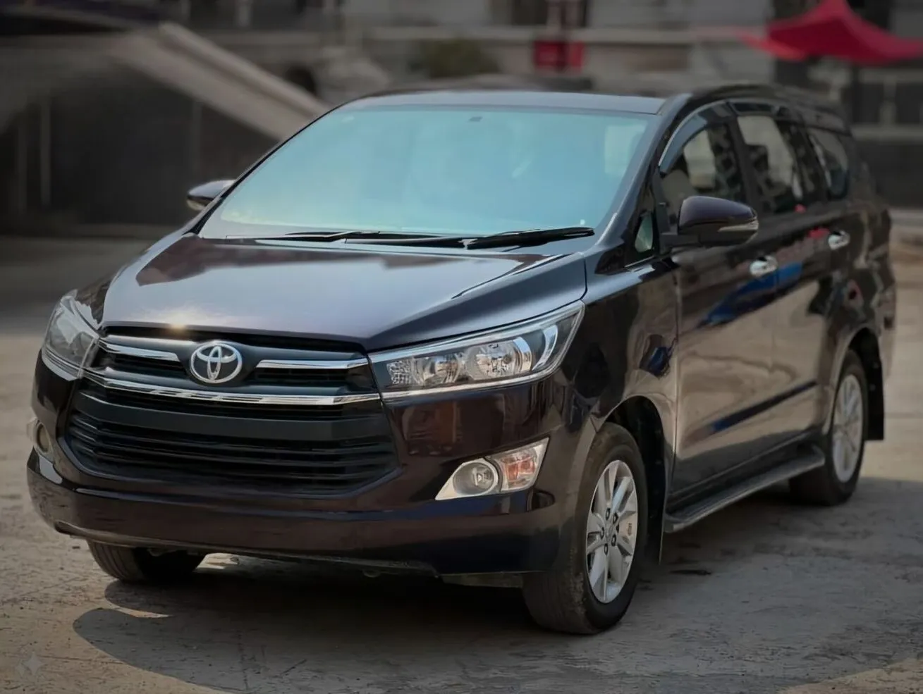 Toyota Innova Blackish Red 7-seater MPV for rent in Cebu