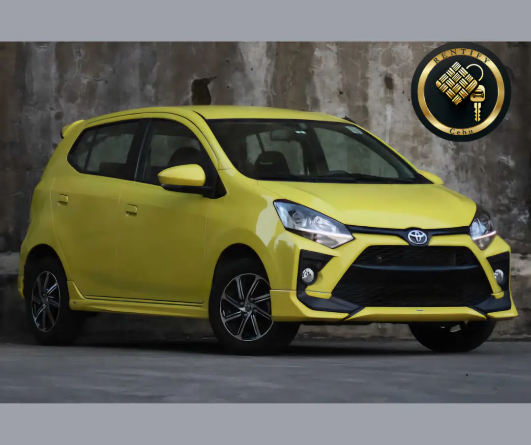 Toyota Wigo in yellow, a 5-seater hatchback for rent in Cebu