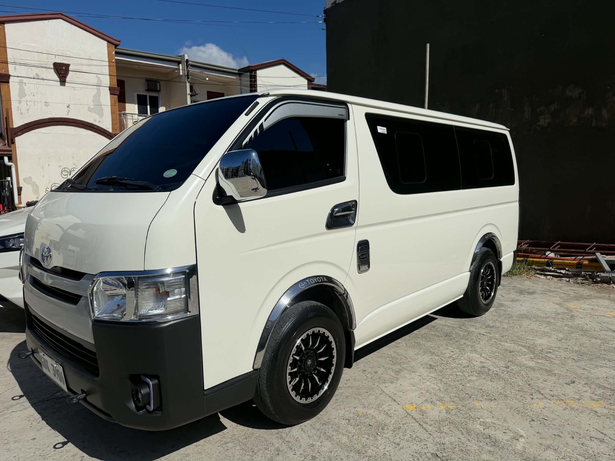 Toyota Hiace Commuter White passenger van for rent in Cebu